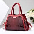 Elegant deep red crocodile pattern handbag with gold hardware and detachable strap - Wine Red