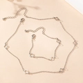 Set collana e bracciale con trifoglio d'argento e design floreale traforato di stile - Argento