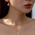 Elegante conjunto de joyas de estrella del norte dorada con collar y pendientes - Dorado