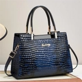 Deep blue faux lizard texture handbag with gold hardware and double black handles - Blue