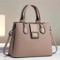 Elegant nude pink embossed textured handbag with crossbody strap and metal buckle - Khaki