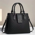 Black embossed large tote bag for women featuring woven texture and adjustable shoulder strap - Black
