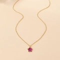 Elegant gold chain necklace featuring a deep purple enamel five-petal flower pendant - Dark Red