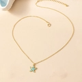 Collier doré avec pendentif étoile de mer en émail bleu clair sur chaîne fine - Bleu sarcelle
