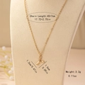 Detail of gold letter Y necklace with bamboo texture pendant on a jewelry display stand - Letter Y