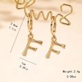 Detail view of gold bamboo texture letter F earring with size and weight measurements - Letter F Style