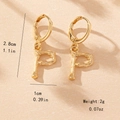 Detailed view of gold bamboo letter P earrings showing 2.8cm height and 1cm width dimensions - Letter P Style
