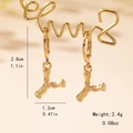 Macro detail of gold bamboo letter Y earring with size and weight measurements - Letter Y Style