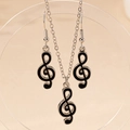 Elegant music note jewelry set featuring silver treble clef pendant and drop earrings - Black Treble Clef 2-Piece Set