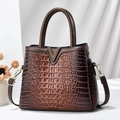 Brown crocodile embossed leather tote bag with gold V detail and adjustable shoulder strap - Red