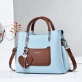 Light blue pebbled leather handbag with brown handles and Fashion Queen logo print - Sky Blue