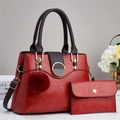 Red leather tote handbag set with detachable shoulder strap and tassel charm - Burgundy