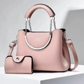 Pink lychee grain leather bucket bag set with silver chain and classic lettering - Pink