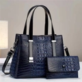 Detailansicht der Kroko-Ledertasche mit silberner H-förmiger Metallschnalle - 2-teiliges Set (Tote + Innentasche) / Blau