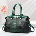 Deep green crocodile embossed tote bag with gold hardware and a detachable shoulder strap - Green