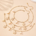 Detailed view of three gold-tone chains with natural seashells and starfish pendants - Pearl White Three-piece Set