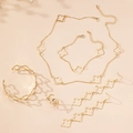 Set gioielli dorati 5 pezzi con collana, bracciale e anello a forma di quadrifoglio - Set da 5 pezzi color oro