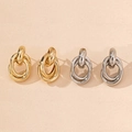 Detail of interlocking triple-ring earrings in polished gold and silver finish - Gold & Silver Oval Stud Earrings 2-Pair Set