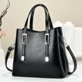 Retro black leather tote bag with silver hardware and adjustable shoulder strap - Black