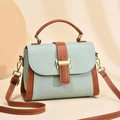 Litchi pattern crossbody bag in mint green and caramel with golden H-clasp - Green
