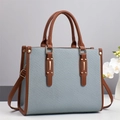 Retro striped tote bag in blue textured fabric with brown leather handles and gold hardware - Blue
