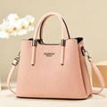 Borsa a mano plissettata rosa con scritta Fashion Queen, doppi manici e tracolla inclusa - Rosa