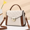 Elegant beige embossed crossbody bag with brown leather accents and gold hardware - Off-white