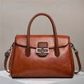 Brown textured leather tote bag with vintage V-logo and adjustable shoulder strap - Earthy Yellow