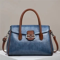 Blue crocodile pattern crossbody bag with brown handles and elegant V metal buckle - Blue
