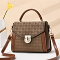 Chic embossed square handbag with Earth-tone patchwork and gold rotary lock closure - Brown