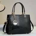 Detail of lizard-pattern glossy leather handbag with elegant swan metal ornament and gold hardware - Black (806-2#)
