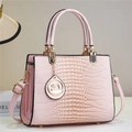 Detail of pink faux lizard skin handbag with gold swan charm and adjustable strap - Pink (806-2#)