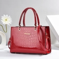 Elegant red crocodile texture handbag with polished gold logo and detachable shoulder strap - Burgundy