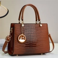 Detail of brown lizard pattern leather handbag with gold swan pendant and hardware - Earthy Yellow (806-3#)