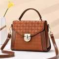Brown embossed leather handbag for women featuring top handle and adjustable strap - Khaki/Earth Yellow