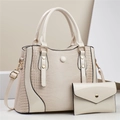 Lizard embossed two-piece handbag set with tote and envelope clutch in cream beige - Two-Piece Set / Off White