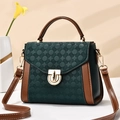 Vintage green embossed leather handbag with brown trim and golden ring swivel lock - Dark Green