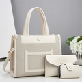 Three-piece beige tote bag set featuring woven texture and minimalist crossbody designs - White