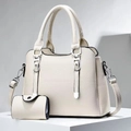 Detail of white lychee pattern leather tote bag set with matching small flap wallet - Off-white