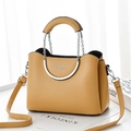 Chic mustard yellow flap bag with round metal handle and silver chain strap details - Yellow