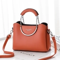 Vibrant orange chain square bag with silver metal handle and adjustable leather strap - Orange