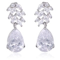Macro view of silver tassel earrings with teardrop cubic zirconia and leaf patterns - Silver Teardrop Leaf Dangle