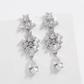 Detailed close-up of tassel earrings with marquise and pear-cut cubic zirconia crystals - Silver Floral Teardrop Dangle