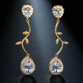 Exquisite golden tassel earrings featuring vine design and sparkling zircon stones for gala - 18K Gold Vine Teardrop Dangle