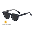 Square photochromic sunglasses with black frames and silver arrow metal accents - Bright Black to Grey