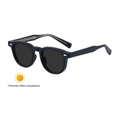 Square photochromic sunglasses with dark grey lenses and silver diamond rivets - Matte Black to Grey