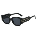 Gafas de sol redondas negras retro con detalles dorados y lentes oscuras en vista de 45 grados - Régulier / Montura Negra Lentes Grises