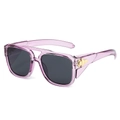 Fashionable square purple transparent sunglasses with gold cross wing bridge and dark lenses - Regular / Purple Frame Grey Lens