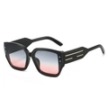 Classic black cat-eye sunglasses with blue-pink gradient lenses and gold metal accents - Black Frame Grey Pink Lens
