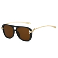 Lunettes de soleil aviateur noires avec détail nœud doré et verres teintés marron - Monture Noire Verres Thé